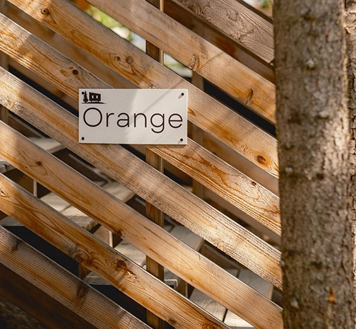 Orange Cabin Sign and Entrance